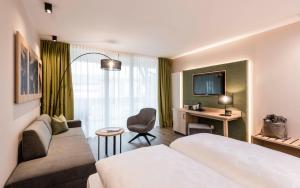 Voodi või voodid majutusasutuse Hotel Clara toas
