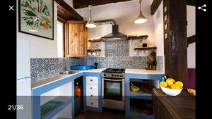 Una cocina o zona de cocina en La Bella Sombra
