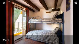 Habitación con 2 literas y balcón. en La Bella Sombra, en Mareny Barraquetas 14 fotos más