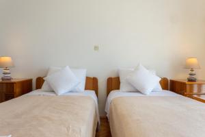 Postel nebo postele na pokoji v ubytování Apartment Sea to Sky Dubrovnik