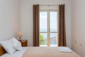 Postel nebo postele na pokoji v ubytování Apartment Sea to Sky Dubrovnik