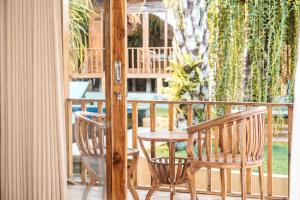 Balkón nebo terasa v ubytování Ocho Bali Surf Camp
