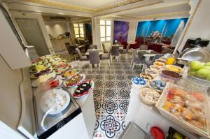 a buffet line with many different types of food at Hotel Coliseum in Istanbul