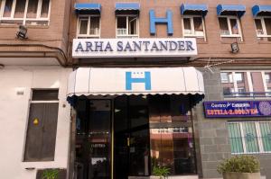 a building with a sign on the front of it at Hotel Arha Santander in Santander