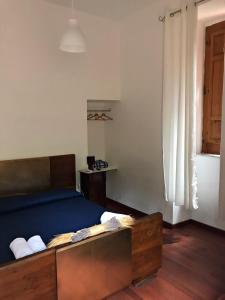 A bed or beds in a room at Villa Rica