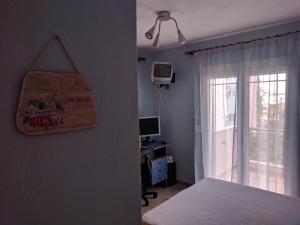 TV a/nebo společenská místnost v ubytování Prinos Apartment