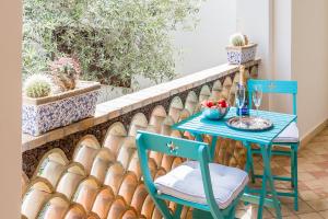 La Matrangela Charme Apartments的阳台或露台