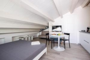 Postel nebo postele na pokoji v ubytování Aruci b&b