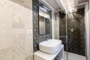 Koupelna v ubytování Aruci b&b + 37 fotografií