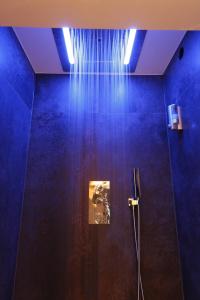 Koupelna v ubytování Chambres d'hôtes Le Repère des Anges et SPA