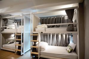 เตียงสองชั้นในห้องที่ Siam Eco Hostel