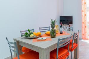 A television and/or entertainment centre at Casa Angelica