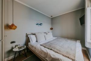 Posteľ alebo postele v izbe v ubytovaní Luxury Seafront Palazzo