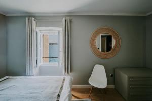 Posteľ alebo postele v izbe v ubytovaní Luxury Seafront Palazzo