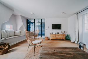 Televízia a/alebo spoločenská miestnosť v ubytovaní Luxury Seafront Palazzo