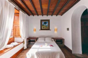 Posteľ alebo postele v izbe v ubytovaní La Casona de Yaiza