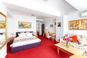 מיטה או מיטות בחדר ב-Bucur Accommodation