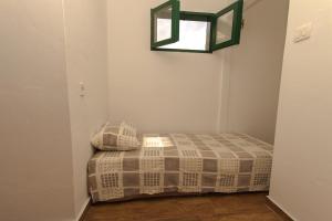 Una cama o camas en una habitación de Rustic Stone House