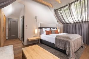 Postel nebo postele na pokoji v ubytování Hotel Goldene Sonne
