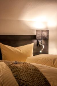 Llit o llits en una habitació de Wilbergerhof RoyalThai