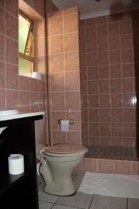 A bathroom at Sunset Residence