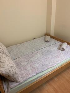 Postel nebo postele na pokoji v ubytování Apartmani Jovanovic