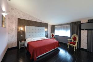 Postel nebo postele na pokoji v ubytování Hotel Relax Roma Nord
