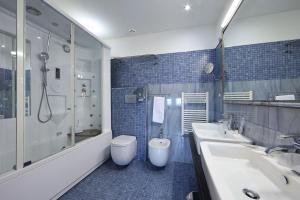 Koupelna v ubytování Hotel Relax Roma Nord