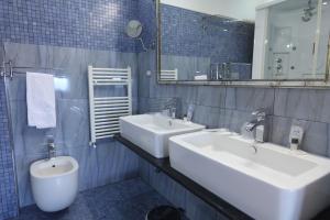 Koupelna v ubytování Hotel Relax Roma Nord
