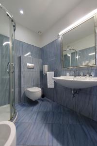 Koupelna v ubytování Hotel Relax Roma Nord