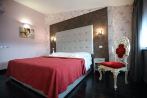 Postel nebo postele na pokoji v ubytování Hotel Relax Roma Nord