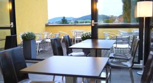 Reštaurácia alebo iné gastronomické zariadenie v ubytovaní PLAZA INN Salzburg City