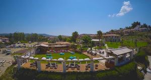 an aerial view of a resort with a park at Villa Fourka 2 on the beach in Fourka