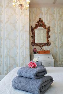 Postel nebo postele na pokoji v ubytování Miglioranzi Rooms
