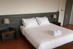 Postel nebo postele na pokoji v ubytování VIYA lodge