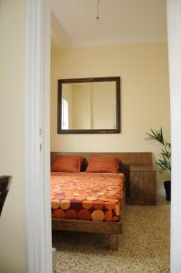 A bed or beds in a room at Mosaics aprtm in the Historical centre with Acropolis view