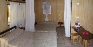 Postel nebo postele na pokoji v ubytování Village Temanuata