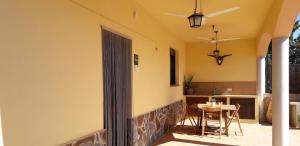 a patio with a table and a dining room at Font Major in Horta de San Joan