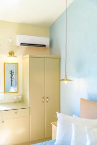 Posteľ alebo postele v izbe v ubytovaní Panas Hotel
