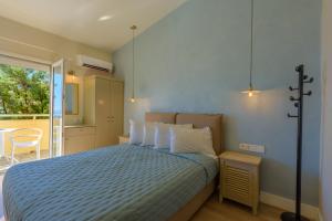 Posteľ alebo postele v izbe v ubytovaní Panas Hotel