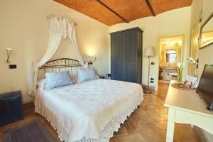 Postel nebo postele na pokoji v ubytování B&B Daria - Deb'S Monticchiello