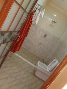 an overhead view of a bathroom with a toilet at Esikar Gardens Hotel in Narok