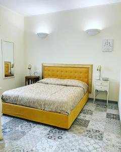 A bed or beds in a room at B&B ALVINO