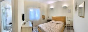 Postel nebo postele na pokoji v ubytování B&B ALVINO