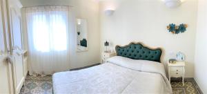 Postel nebo postele na pokoji v ubytování B&B ALVINO