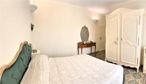 Postel nebo postele na pokoji v ubytování B&B ALVINO
