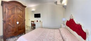 Postel nebo postele na pokoji v ubytování B&B ALVINO