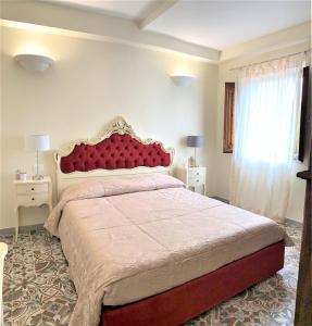 Postel nebo postele na pokoji v ubytování B&B ALVINO