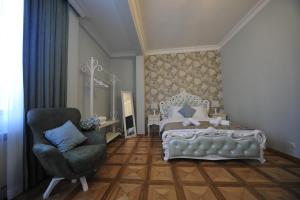 Postel nebo postele na pokoji v ubytování Guest House Batumi Globus
