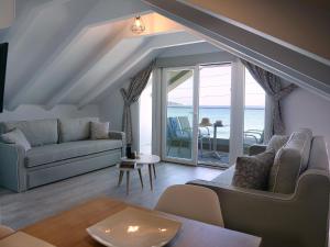 Χώρος καθιστικού στο Anemoessa Elegant Apartments